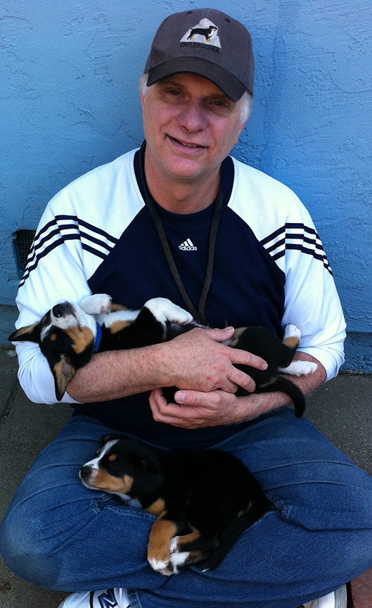 Scott with puppies